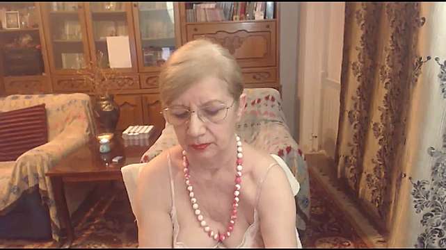 OneMatureCarla naked stripping on cam for live sex video chat