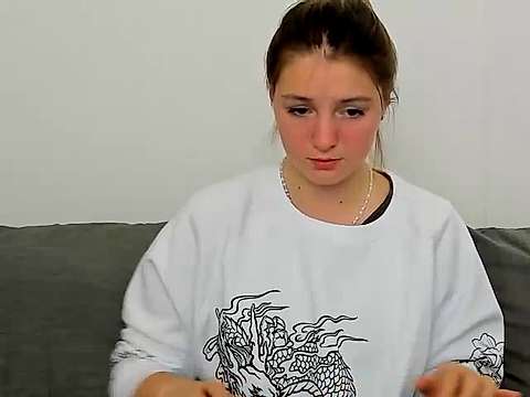 Ameli-Kiss naked stripping on cam for live sex video chat
